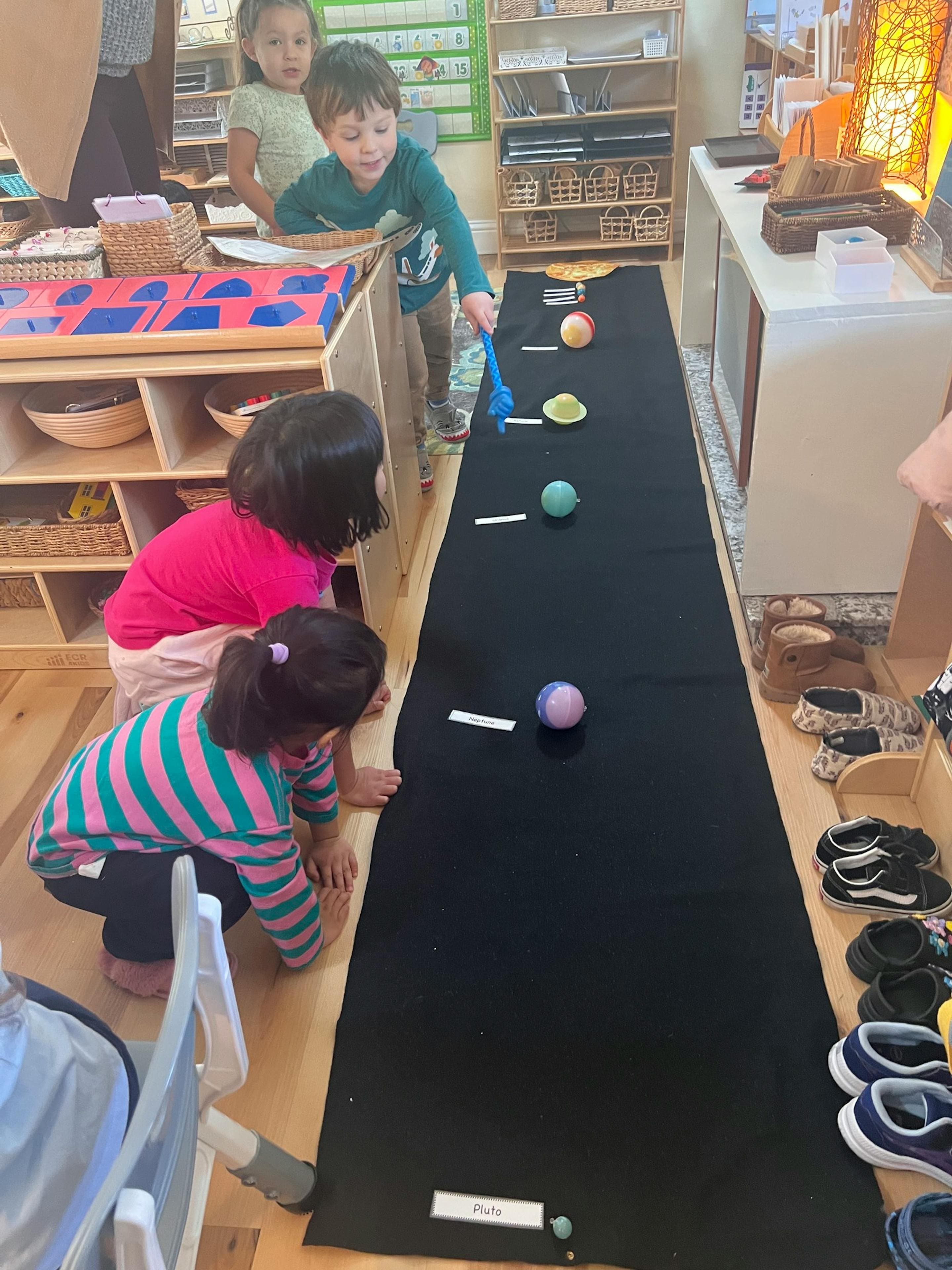 Children exploring the solar system